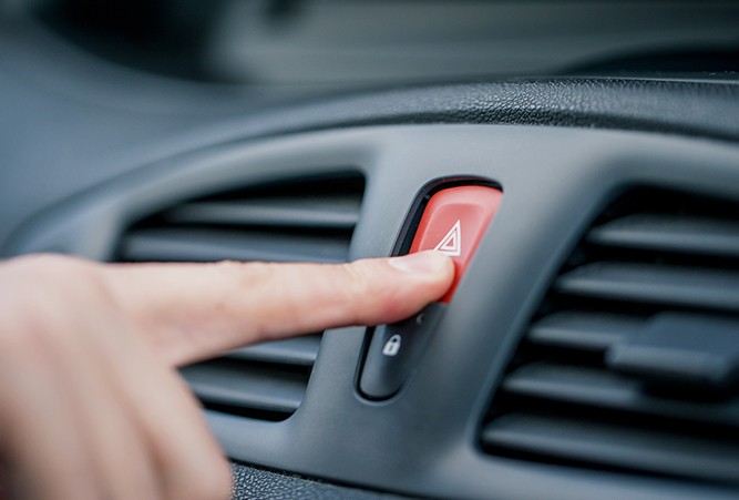 Driver-Pushing-Hazard-Button